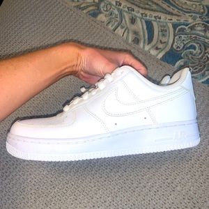 White Nike Air Force ones.